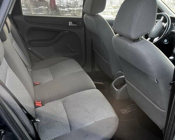 Синий Форд Фокус, объемом двигателя 1.6 л и пробегом 291 тыс. км за 3900 $, фото 7 на Automoto.ua