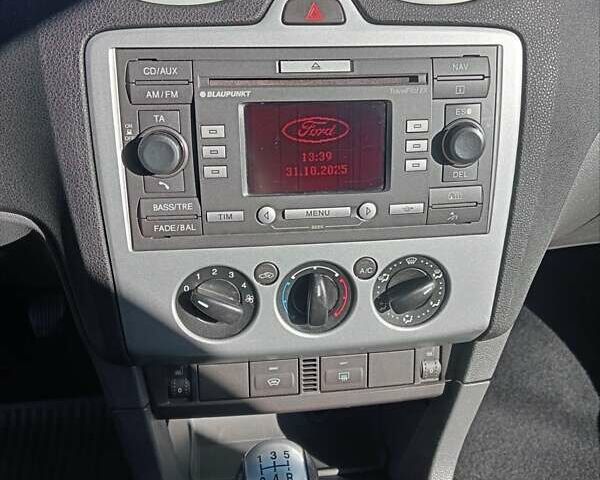 Синий Форд Фокус, объемом двигателя 1.56 л и пробегом 313 тыс. км за 4450 $, фото 16 на Automoto.ua