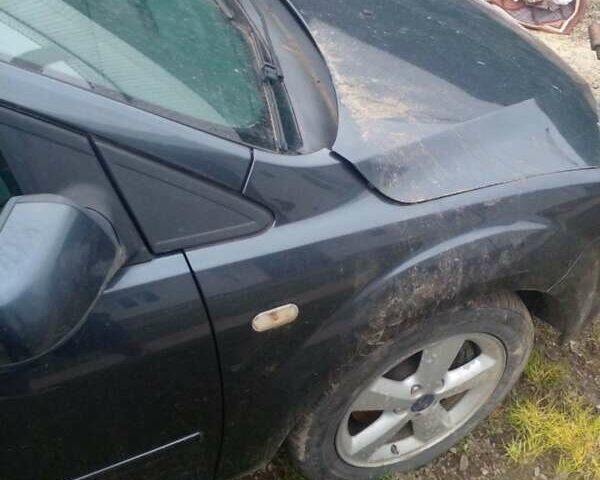 Синий Форд Фокус, объемом двигателя 1.8 л и пробегом 220 тыс. км за 2700 $, фото 2 на Automoto.ua