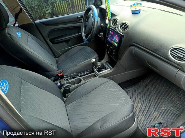 Синий Форд Фокус, объемом двигателя 1.6 л и пробегом 300 тыс. км за 3900 $, фото 10 на Automoto.ua