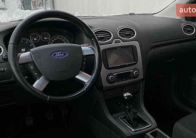 Синий Форд Фокус, объемом двигателя 1.6 л и пробегом 231 тыс. км за 5250 $, фото 29 на Automoto.ua