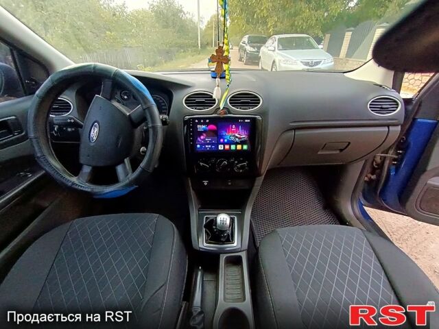 Синий Форд Фокус, объемом двигателя 1.6 л и пробегом 300 тыс. км за 3900 $, фото 9 на Automoto.ua