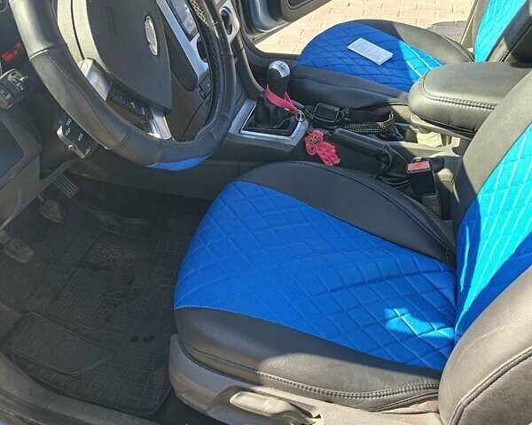 Синий Форд Фокус, объемом двигателя 1.56 л и пробегом 370 тыс. км за 4800 $, фото 2 на Automoto.ua