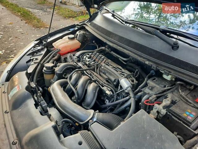 Синий Форд Фокус, объемом двигателя 1.6 л и пробегом 360 тыс. км за 4550 $, фото 100 на Automoto.ua