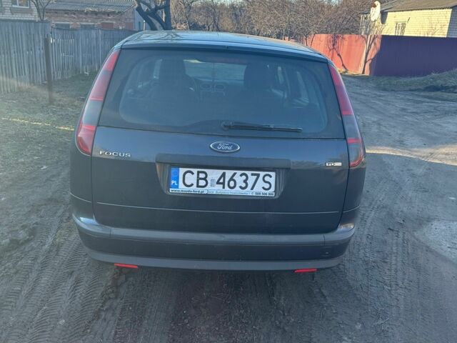 Синий Форд Фокус, объемом двигателя 1.8 л и пробегом 300 тыс. км за 2396 $, фото 3 на Automoto.ua