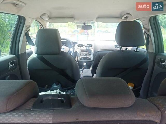 Синий Форд Фокус, объемом двигателя 1.8 л и пробегом 255 тыс. км за 4300 $, фото 17 на Automoto.ua