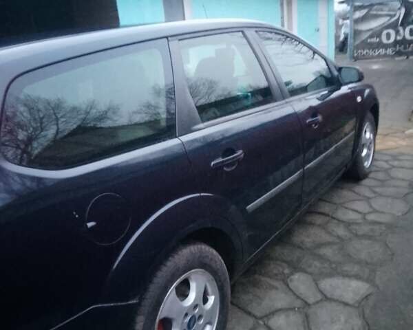 Синий Форд Фокус, объемом двигателя 1.6 л и пробегом 370 тыс. км за 3900 $, фото 1 на Automoto.ua