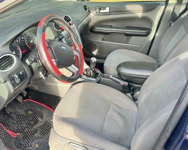 Синий Форд Фокус, объемом двигателя 1.6 л и пробегом 360 тыс. км за 3900 $, фото 6 на Automoto.ua