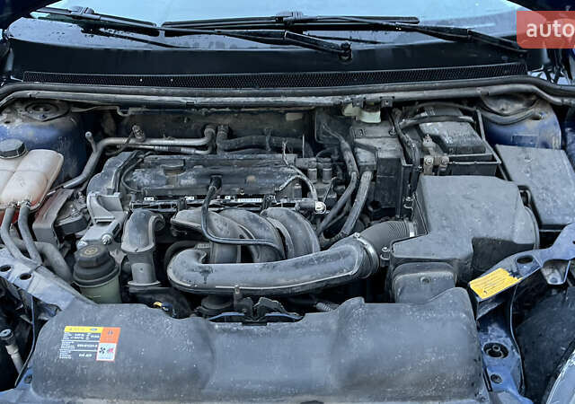 Синий Форд Фокус, объемом двигателя 1.6 л и пробегом 306 тыс. км за 4850 $, фото 11 на Automoto.ua