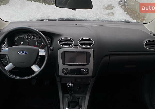 Синий Форд Фокус, объемом двигателя 1.6 л и пробегом 231 тыс. км за 5250 $, фото 28 на Automoto.ua