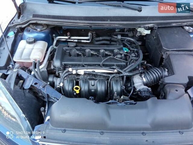 Синий Форд Фокус, объемом двигателя 1.8 л и пробегом 282 тыс. км за 5100 $, фото 16 на Automoto.ua