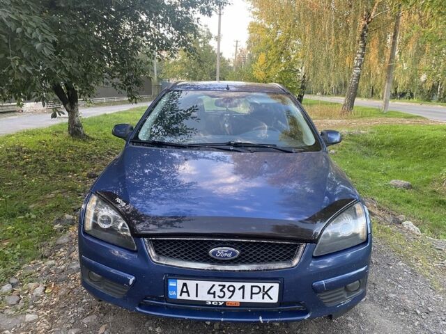 Синій Форд Фокус, об'ємом двигуна 2 л та пробігом 400 тис. км за 3110 $, фото 1 на Automoto.ua