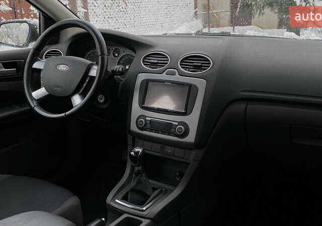 Синий Форд Фокус, объемом двигателя 1.6 л и пробегом 231 тыс. км за 5250 $, фото 30 на Automoto.ua