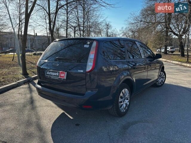 Синий Форд Фокус, объемом двигателя 1.8 л и пробегом 233 тыс. км за 4990 $, фото 6 на Automoto.ua