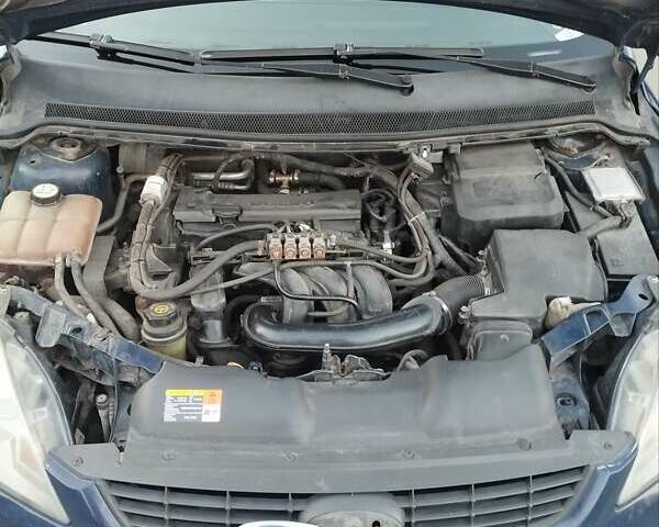 Синій Форд Фокус, об'ємом двигуна 1.6 л та пробігом 280 тис. км за 4800 $, фото 23 на Automoto.ua