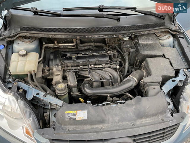 Синий Форд Фокус, объемом двигателя 1.6 л и пробегом 208 тыс. км за 5200 $, фото 22 на Automoto.ua