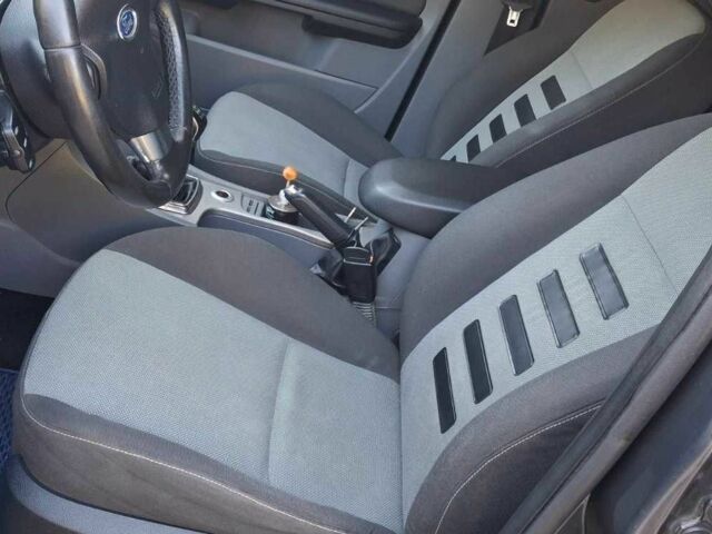 Синій Форд Фокус, об'ємом двигуна 1.6 л та пробігом 454 тис. км за 4000 $, фото 9 на Automoto.ua