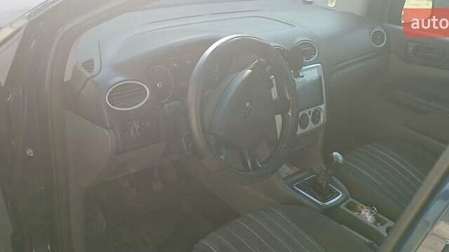 Синий Форд Фокус, объемом двигателя 1.39 л и пробегом 290 тыс. км за 4999 $, фото 5 на Automoto.ua