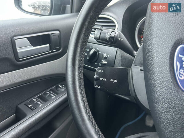 Синий Форд Фокус, объемом двигателя 1.6 л и пробегом 225 тыс. км за 5100 $, фото 26 на Automoto.ua