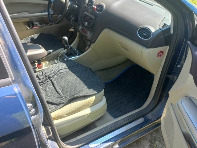 Синій Форд Фокус, об'ємом двигуна 2 л та пробігом 236 тис. км за 4500 $, фото 17 на Automoto.ua