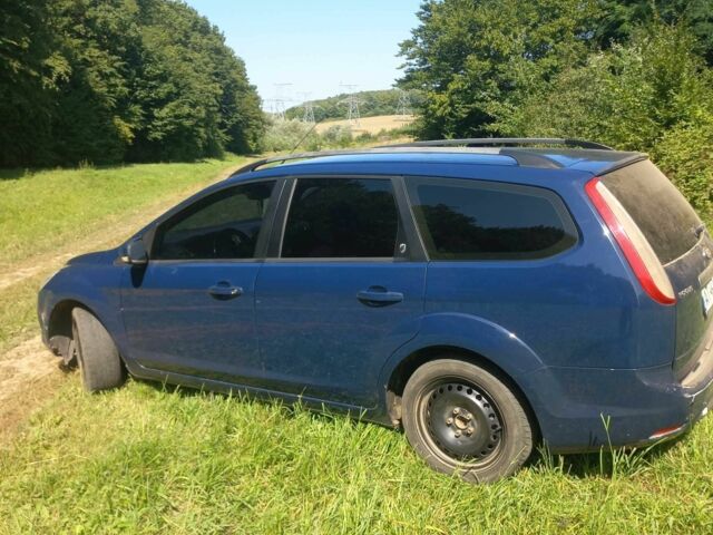 Синій Форд Фокус, об'ємом двигуна 2 л та пробігом 236 тис. км за 4500 $, фото 21 на Automoto.ua