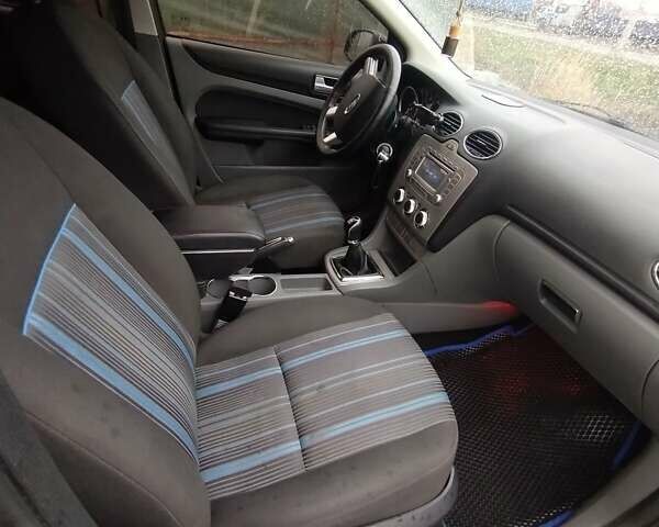 Синий Форд Фокус, объемом двигателя 1.6 л и пробегом 278 тыс. км за 5100 $, фото 14 на Automoto.ua