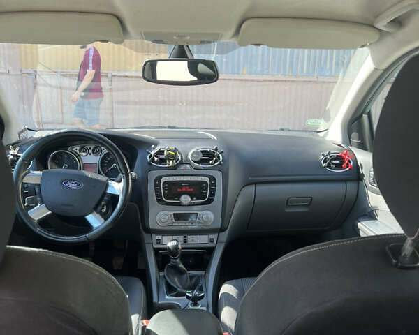 Синий Форд Фокус, объемом двигателя 1.8 л и пробегом 201 тыс. км за 5100 $, фото 10 на Automoto.ua