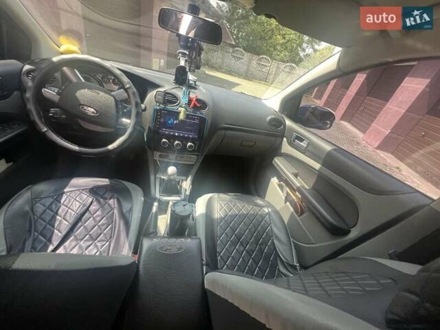Синій Форд Фокус, об'ємом двигуна 1.6 л та пробігом 218 тис. км за 4999 $, фото 16 на Automoto.ua