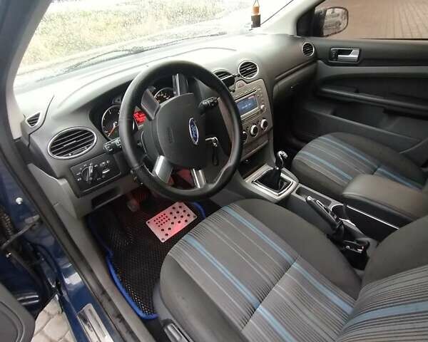 Синий Форд Фокус, объемом двигателя 1.6 л и пробегом 278 тыс. км за 5100 $, фото 12 на Automoto.ua