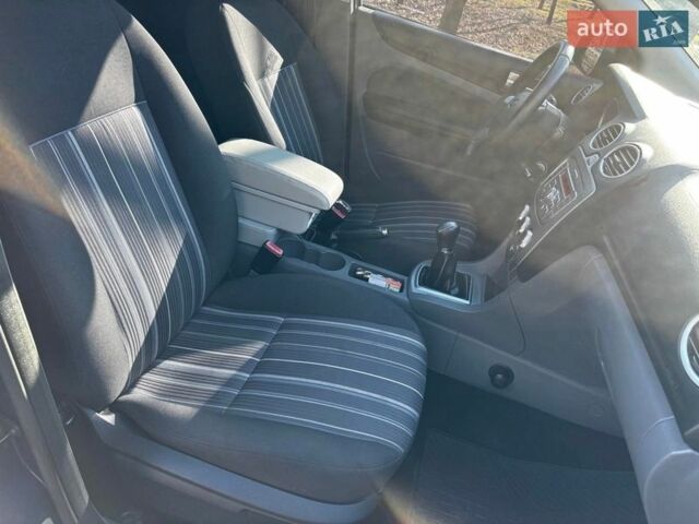 Синий Форд Фокус, объемом двигателя 1.8 л и пробегом 233 тыс. км за 4990 $, фото 16 на Automoto.ua