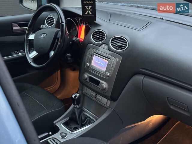 Синий Форд Фокус, объемом двигателя 1.6 л и пробегом 243 тыс. км за 5950 $, фото 24 на Automoto.ua