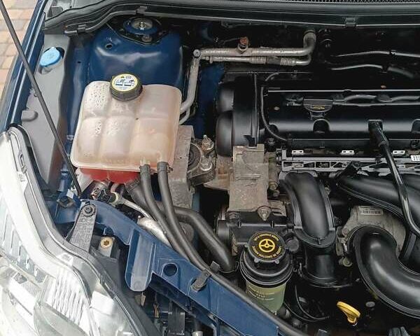 Синій Форд Фокус, об'ємом двигуна 1.6 л та пробігом 201 тис. км за 5950 $, фото 11 на Automoto.ua