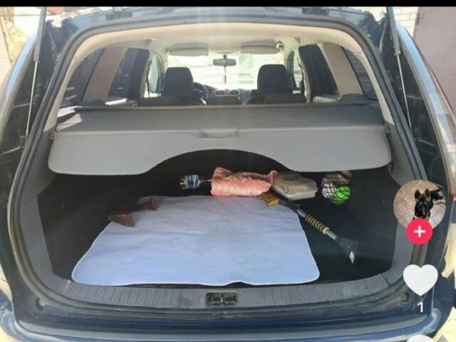 Синій Форд Фокус, об'ємом двигуна 2 л та пробігом 214 тис. км за 5000 $, фото 4 на Automoto.ua