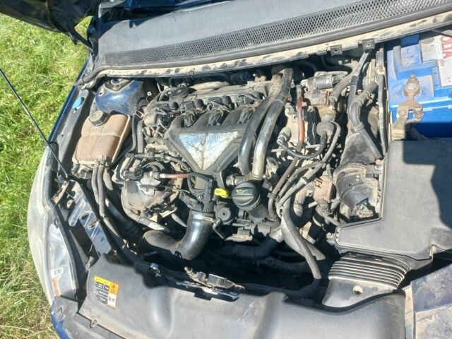 Синій Форд Фокус, об'ємом двигуна 2 л та пробігом 236 тис. км за 4500 $, фото 18 на Automoto.ua