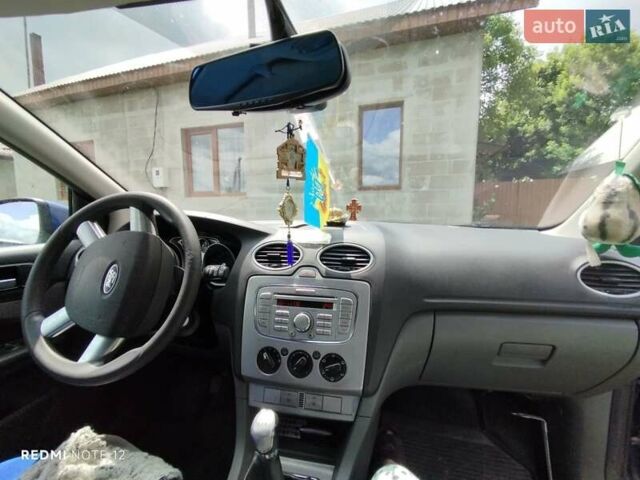 Синий Форд Фокус, объемом двигателя 1.6 л и пробегом 298 тыс. км за 4700 $, фото 4 на Automoto.ua