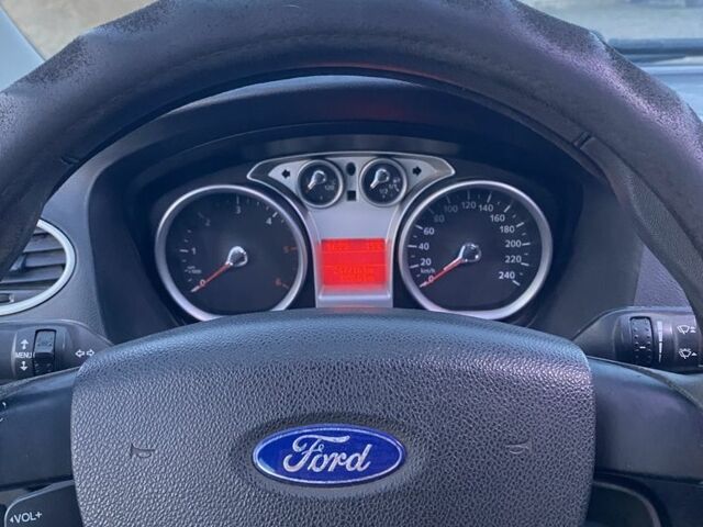 Синий Форд Фокус, объемом двигателя 1.6 л и пробегом 247 тыс. км за 4650 $, фото 7 на Automoto.ua