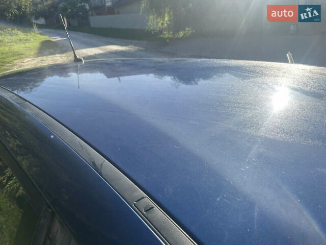 Синий Форд Фокус, объемом двигателя 2 л и пробегом 213 тыс. км за 5000 $, фото 4 на Automoto.ua