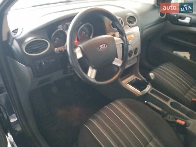 Синій Форд Фокус, об'ємом двигуна 1.4 л та пробігом 187 тис. км за 5500 $, фото 3 на Automoto.ua