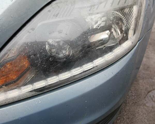 Синій Форд Фокус, об'ємом двигуна 2 л та пробігом 311 тис. км за 6000 $, фото 1 на Automoto.ua