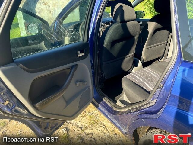 Синий Форд Фокус, объемом двигателя 2 л и пробегом 213 тыс. км за 5500 $, фото 11 на Automoto.ua