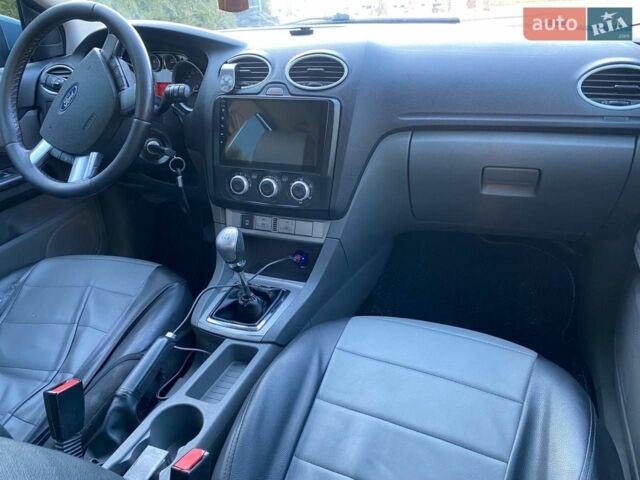 Синій Форд Фокус, об'ємом двигуна 1.6 л та пробігом 370 тис. км за 5400 $, фото 14 на Automoto.ua