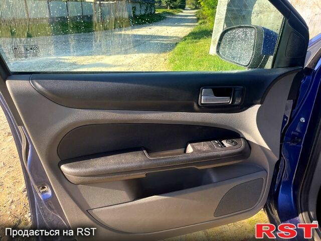 Синий Форд Фокус, объемом двигателя 2 л и пробегом 213 тыс. км за 5500 $, фото 12 на Automoto.ua