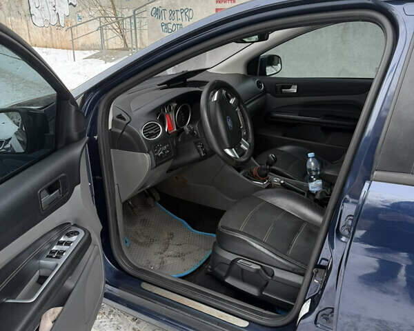 Синий Форд Фокус, объемом двигателя 1.6 л и пробегом 285 тыс. км за 5250 $, фото 20 на Automoto.ua