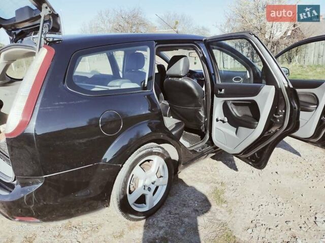 Синій Форд Фокус, об'ємом двигуна 1.56 л та пробігом 259 тис. км за 5350 $, фото 22 на Automoto.ua