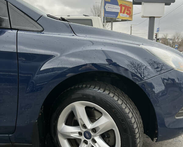 Синий Форд Фокус, объемом двигателя 1.8 л и пробегом 312 тыс. км за 5200 $, фото 8 на Automoto.ua