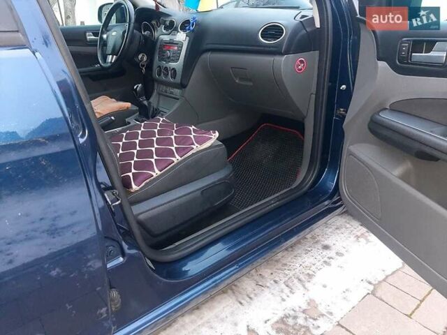 Синій Форд Фокус, об'ємом двигуна 1.56 л та пробігом 218 тис. км за 5500 $, фото 37 на Automoto.ua