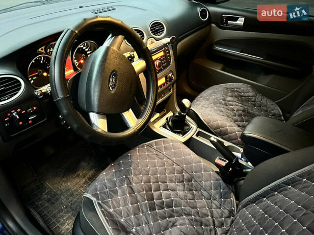 Синій Форд Фокус, об'ємом двигуна 1.56 л та пробігом 241 тис. км за 6599 $, фото 15 на Automoto.ua