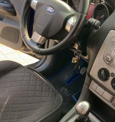 Синий Форд Фокус, объемом двигателя 1.56 л и пробегом 315 тыс. км за 4900 $, фото 7 на Automoto.ua