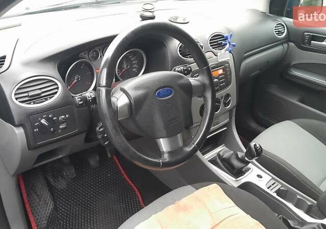 Синій Форд Фокус, об'ємом двигуна 1.6 л та пробігом 216 тис. км за 5450 $, фото 30 на Automoto.ua