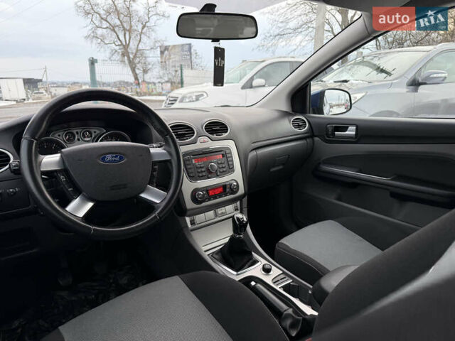Синий Форд Фокус, объемом двигателя 1.8 л и пробегом 116 тыс. км за 7499 $, фото 25 на Automoto.ua
